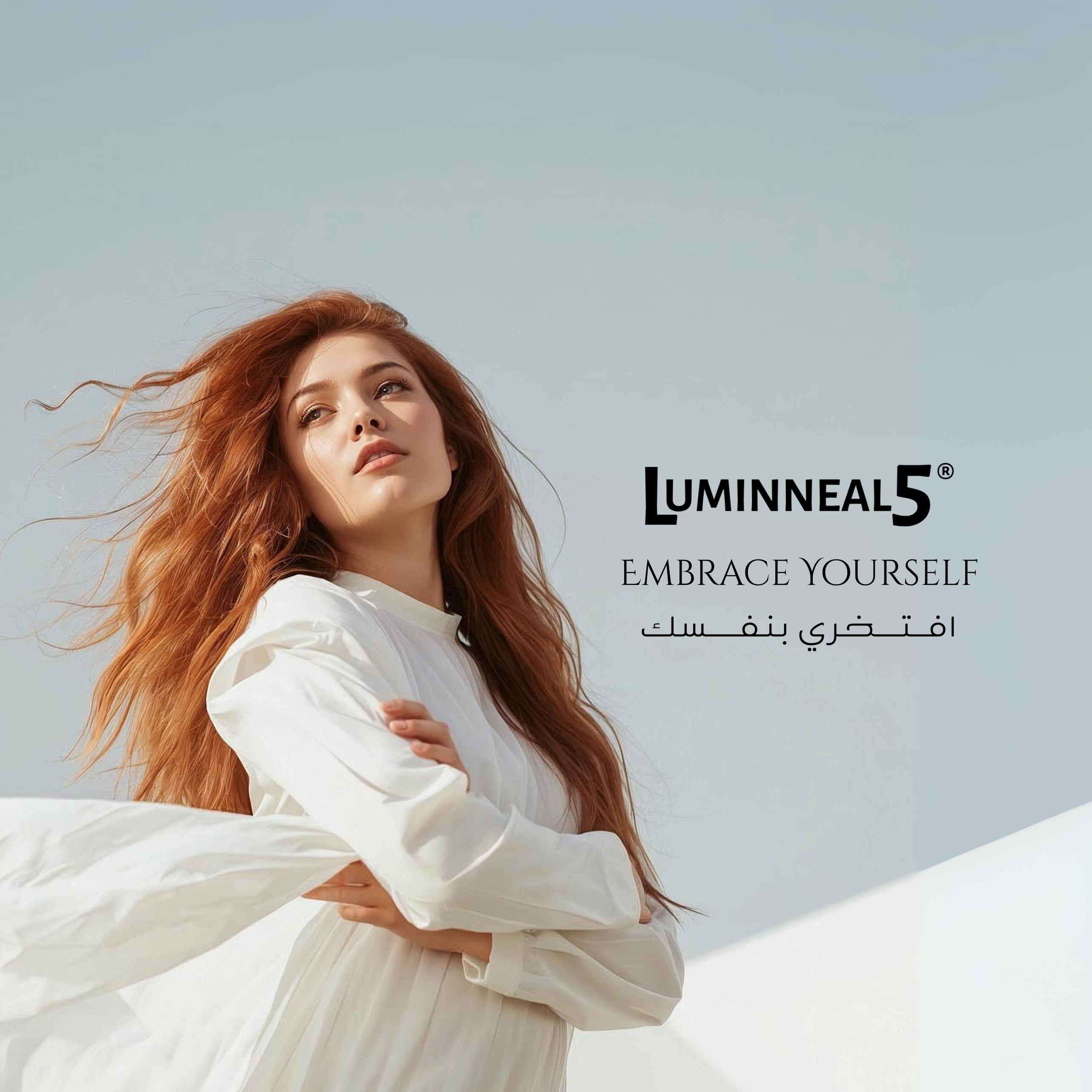 Woman with long red hair wearing a white outfit against a light blue sky, with Luminneal5 branding.